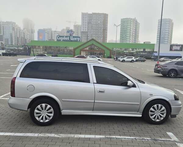 Серый Опель Астра, объемом двигателя 1.36 л и пробегом 349 тыс. км за 3300 $, фото 2 на Automoto.ua