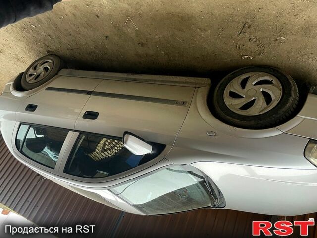 Серый Опель Астра, объемом двигателя 1.7 л и пробегом 250 тыс. км за 1750 $, фото 5 на Automoto.ua