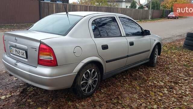 Серый Опель Астра, объемом двигателя 1.6 л и пробегом 140 тыс. км за 2900 $, фото 7 на Automoto.ua