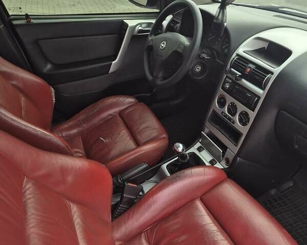 Серый Опель Астра, объемом двигателя 1.36 л и пробегом 349 тыс. км за 3300 $, фото 6 на Automoto.ua