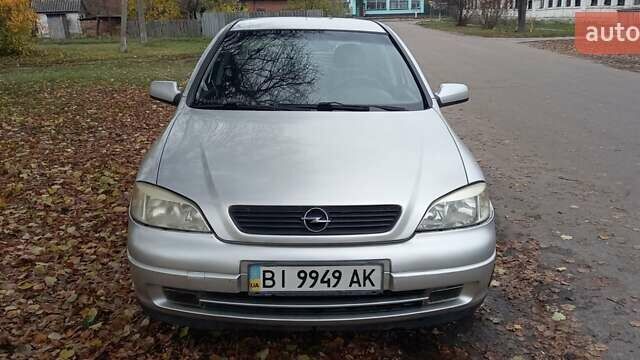 Серый Опель Астра, объемом двигателя 1.6 л и пробегом 140 тыс. км за 2900 $, фото 6 на Automoto.ua