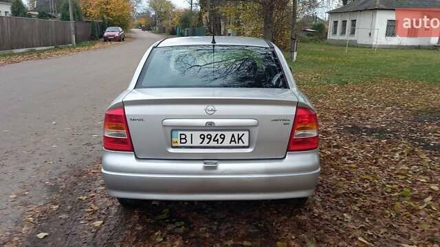 Серый Опель Астра, объемом двигателя 1.6 л и пробегом 140 тыс. км за 2900 $, фото 9 на Automoto.ua