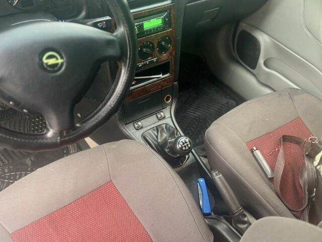 Серый Опель Астра, объемом двигателя 2 л и пробегом 292 тыс. км за 3000 $, фото 10 на Automoto.ua