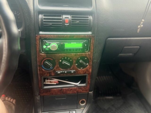 Серый Опель Астра, объемом двигателя 2 л и пробегом 292 тыс. км за 3000 $, фото 17 на Automoto.ua