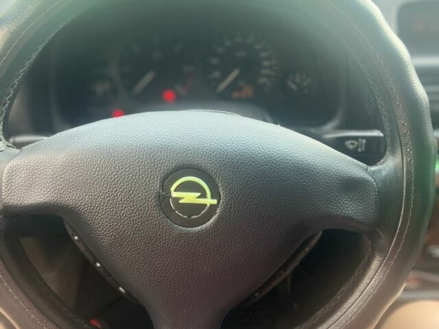 Серый Опель Астра, объемом двигателя 2 л и пробегом 292 тыс. км за 3000 $, фото 20 на Automoto.ua