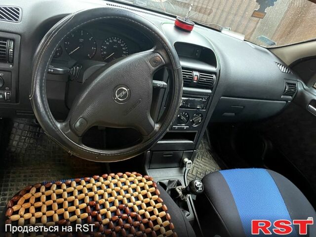 Серый Опель Астра, объемом двигателя 1.7 л и пробегом 250 тыс. км за 1750 $, фото 9 на Automoto.ua