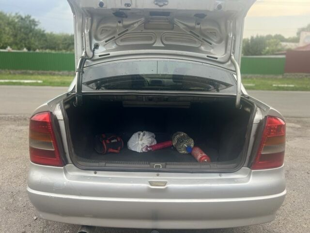 Серый Опель Астра, объемом двигателя 2 л и пробегом 292 тыс. км за 3000 $, фото 16 на Automoto.ua