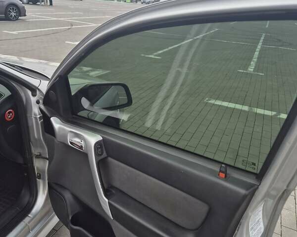 Серый Опель Астра, объемом двигателя 1.36 л и пробегом 349 тыс. км за 3300 $, фото 10 на Automoto.ua