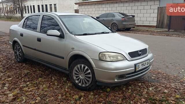 Серый Опель Астра, объемом двигателя 1.6 л и пробегом 140 тыс. км за 2900 $, фото 10 на Automoto.ua