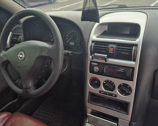 Серый Опель Астра, объемом двигателя 1.36 л и пробегом 349 тыс. км за 3300 $, фото 5 на Automoto.ua