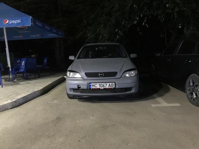 Серый Опель Астра, объемом двигателя 1.4 л и пробегом 420 тыс. км за 1000 $, фото 4 на Automoto.ua