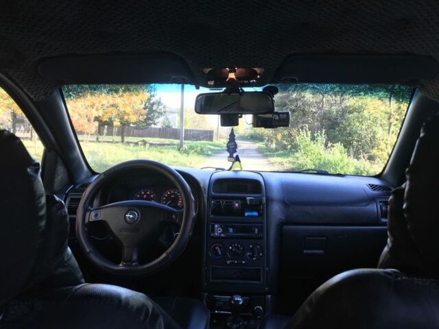 Серый Опель Астра, объемом двигателя 1.4 л и пробегом 420 тыс. км за 1000 $, фото 20 на Automoto.ua