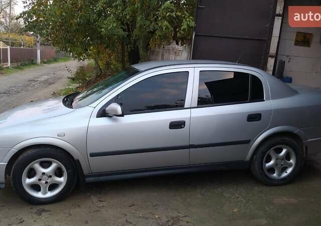 Серый Опель Астра, объемом двигателя 1.4 л и пробегом 200 тыс. км за 4350 $, фото 3 на Automoto.ua