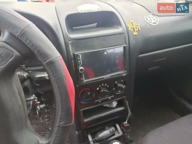 Сірий Опель Астра, об'ємом двигуна 1.4 л та пробігом 340 тис. км за 3700 $, фото 6 на Automoto.ua