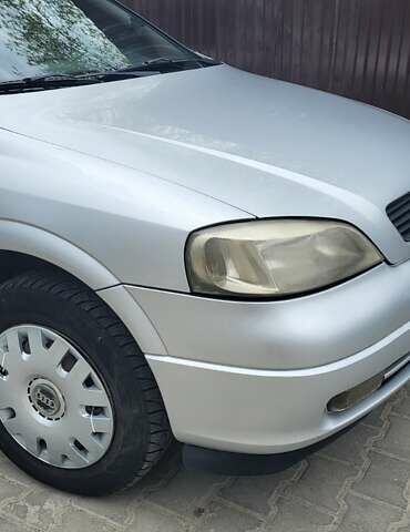 Серый Опель Астра, объемом двигателя 1.6 л и пробегом 248 тыс. км за 4000 $, фото 5 на Automoto.ua