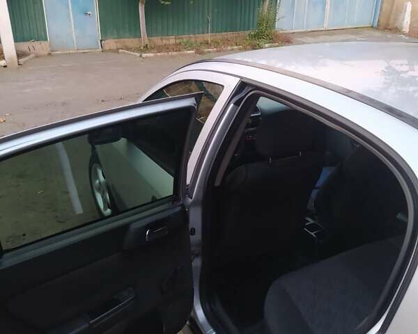 Серый Опель Астра, объемом двигателя 1.4 л и пробегом 200 тыс. км за 4350 $, фото 2 на Automoto.ua