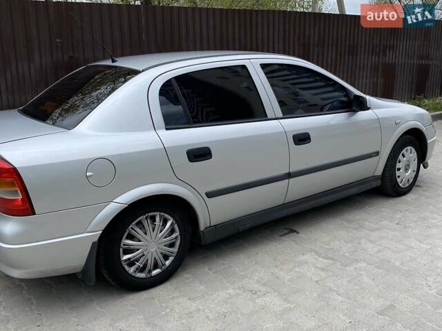 Серый Опель Астра, объемом двигателя 1.6 л и пробегом 248 тыс. км за 4000 $, фото 4 на Automoto.ua