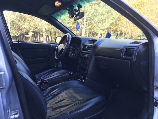 Серый Опель Астра, объемом двигателя 1.4 л и пробегом 420 тыс. км за 1000 $, фото 17 на Automoto.ua