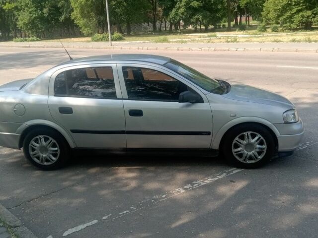 Серый Опель Астра, объемом двигателя 2 л и пробегом 230 тыс. км за 3400 $, фото 2 на Automoto.ua