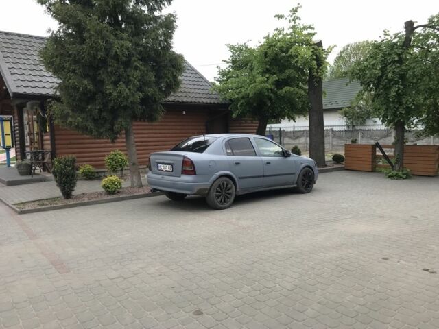 Серый Опель Астра, объемом двигателя 1.4 л и пробегом 420 тыс. км за 1000 $, фото 13 на Automoto.ua