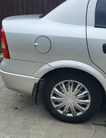 Серый Опель Астра, объемом двигателя 1.6 л и пробегом 248 тыс. км за 4000 $, фото 6 на Automoto.ua