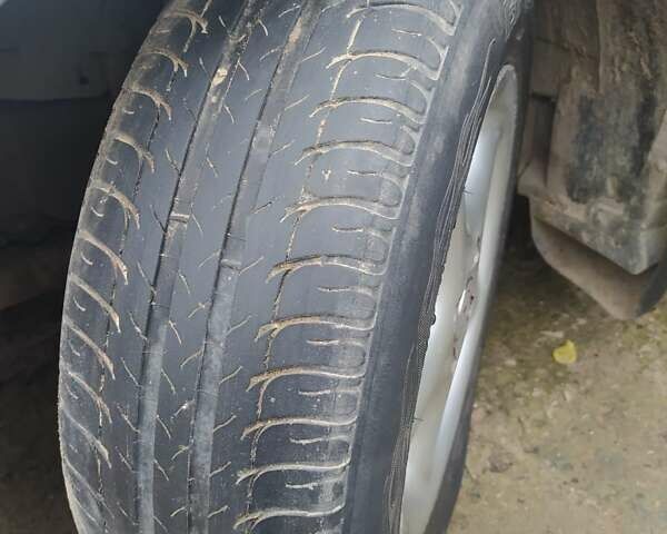 Серый Опель Астра, объемом двигателя 1.4 л и пробегом 200 тыс. км за 4350 $, фото 6 на Automoto.ua