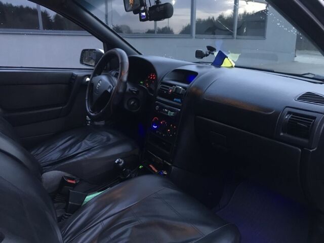 Серый Опель Астра, объемом двигателя 1.4 л и пробегом 420 тыс. км за 1000 $, фото 21 на Automoto.ua