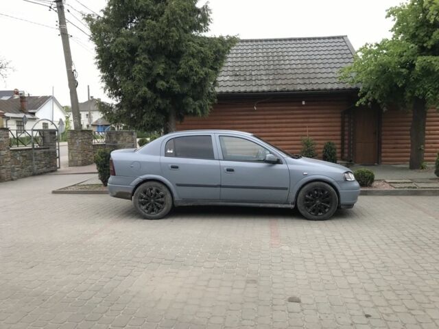 Серый Опель Астра, объемом двигателя 1.4 л и пробегом 420 тыс. км за 1000 $, фото 14 на Automoto.ua