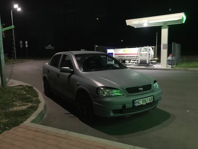 Серый Опель Астра, объемом двигателя 1.4 л и пробегом 420 тыс. км за 1000 $, фото 3 на Automoto.ua