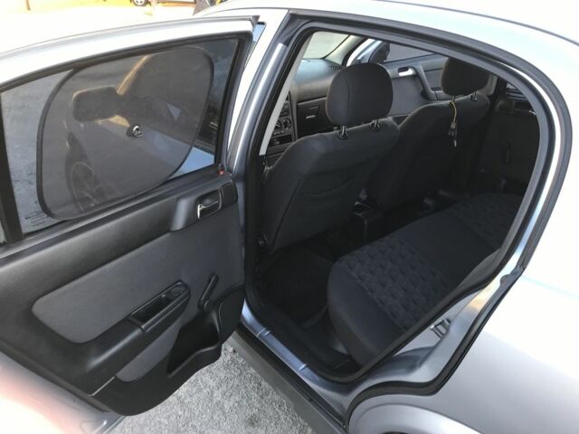 Серый Опель Астра, объемом двигателя 1.4 л и пробегом 254 тыс. км за 3500 $, фото 8 на Automoto.ua