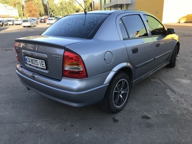 Серый Опель Астра, объемом двигателя 1.4 л и пробегом 254 тыс. км за 3500 $, фото 2 на Automoto.ua