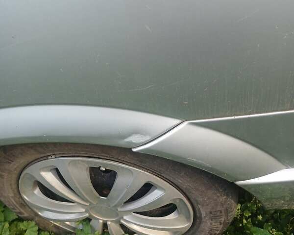 Сірий Опель Астра, об'ємом двигуна 1.39 л та пробігом 245 тис. км за 3200 $, фото 8 на Automoto.ua