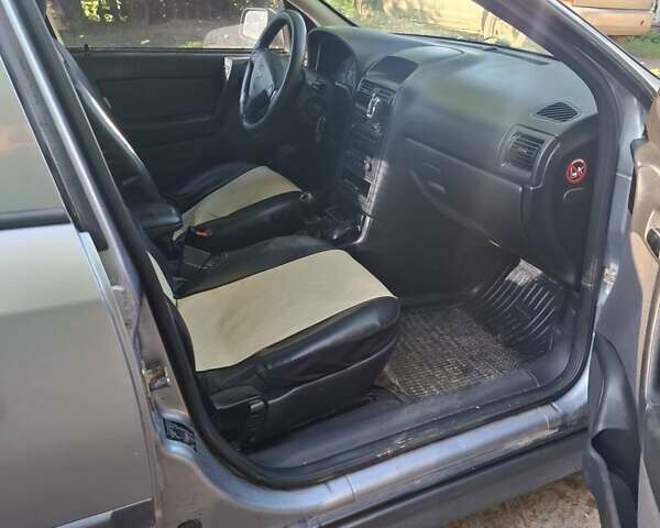 Сірий Опель Астра, об'ємом двигуна 1.6 л та пробігом 322 тис. км за 3100 $, фото 8 на Automoto.ua