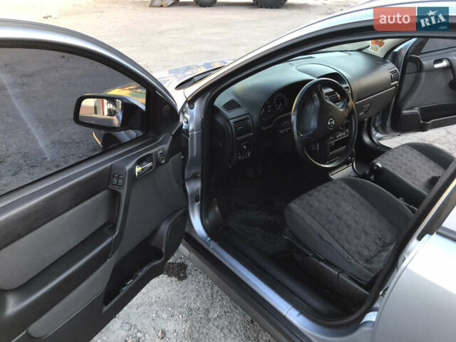 Серый Опель Астра, объемом двигателя 1.4 л и пробегом 254 тыс. км за 3500 $, фото 9 на Automoto.ua