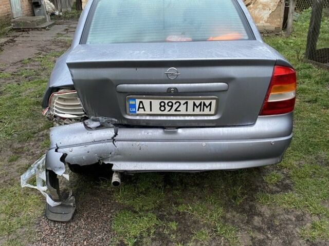 Серый Опель Астра, объемом двигателя 1.4 л и пробегом 160 тыс. км за 2500 $, фото 4 на Automoto.ua