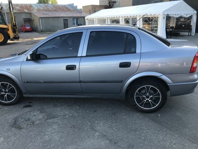 Серый Опель Астра, объемом двигателя 1.4 л и пробегом 254 тыс. км за 3500 $, фото 4 на Automoto.ua