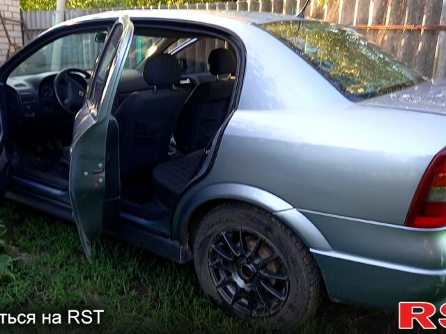 Серый Опель Астра, объемом двигателя 1.6 л и пробегом 340 тыс. км за 2200 $, фото 2 на Automoto.ua