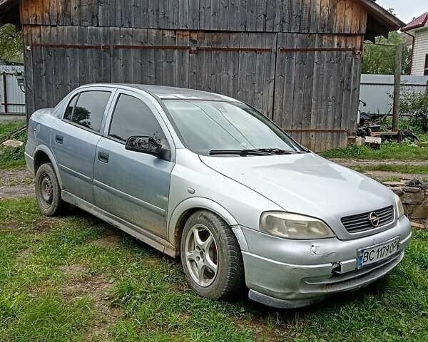 Сірий Опель Астра, об'ємом двигуна 1.6 л та пробігом 230 тис. км за 1700 $, фото 4 на Automoto.ua