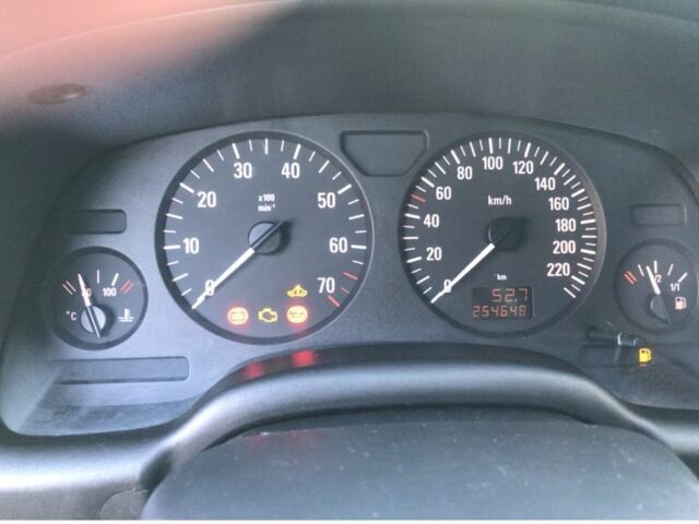 Серый Опель Астра, объемом двигателя 1.4 л и пробегом 254 тыс. км за 3500 $, фото 11 на Automoto.ua