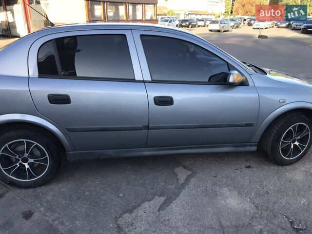 Серый Опель Астра, объемом двигателя 1.4 л и пробегом 254 тыс. км за 3500 $, фото 5 на Automoto.ua