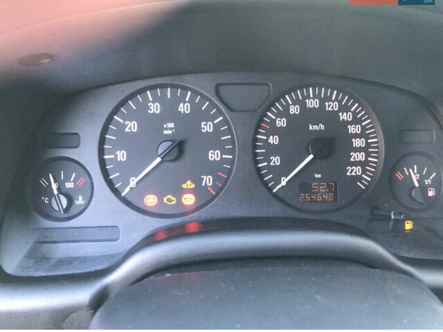 Серый Опель Астра, объемом двигателя 1.4 л и пробегом 254 тыс. км за 3500 $, фото 11 на Automoto.ua