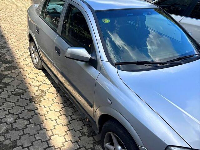 Серый Опель Астра, объемом двигателя 1.4 л и пробегом 300 тыс. км за 3100 $, фото 2 на Automoto.ua