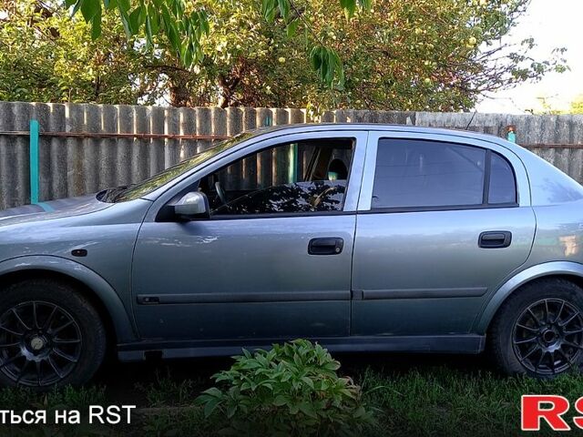 Серый Опель Астра, объемом двигателя 1.6 л и пробегом 340 тыс. км за 2200 $, фото 3 на Automoto.ua