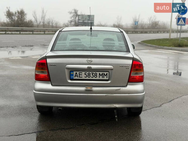 Серый Опель Астра, объемом двигателя 1.4 л и пробегом 300 тыс. км за 2800 $, фото 3 на Automoto.ua