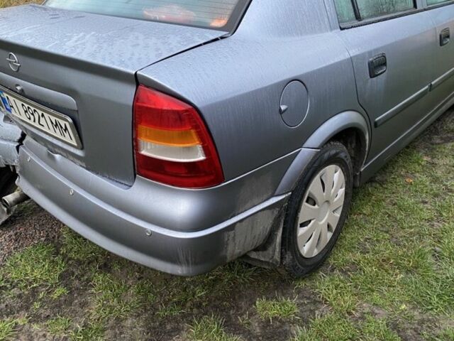 Серый Опель Астра, объемом двигателя 1.4 л и пробегом 160 тыс. км за 2500 $, фото 5 на Automoto.ua
