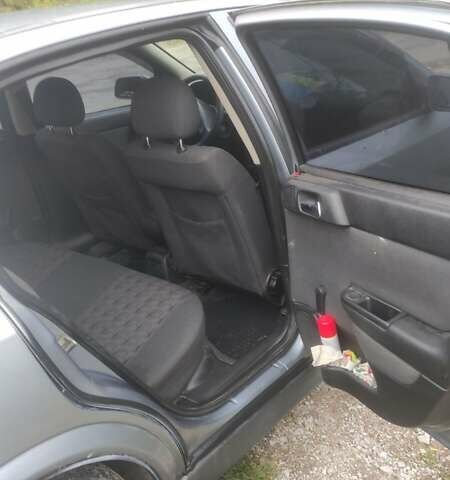 Серый Опель Астра, объемом двигателя 1.6 л и пробегом 178 тыс. км за 3200 $, фото 3 на Automoto.ua