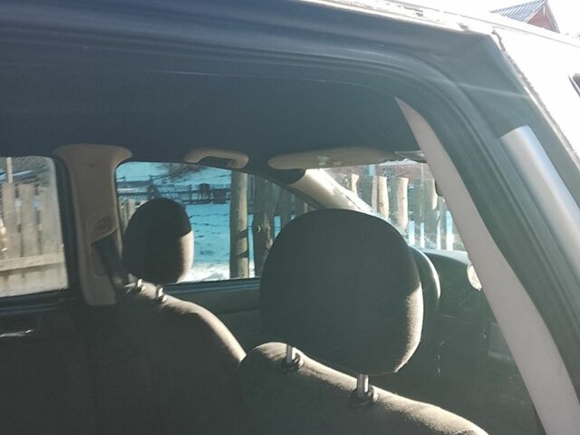 Сірий Опель Астра, об'ємом двигуна 1.6 л та пробігом 2 тис. км за 1450 $, фото 3 на Automoto.ua