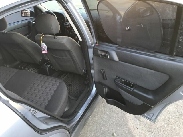 Серый Опель Астра, объемом двигателя 1.4 л и пробегом 254 тыс. км за 3500 $, фото 7 на Automoto.ua