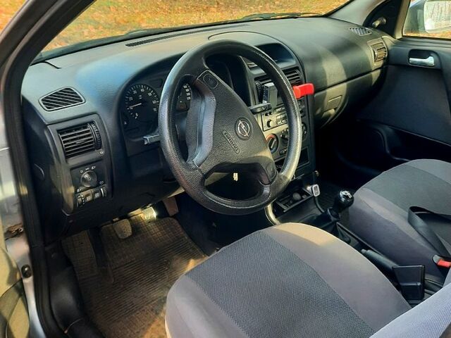 Серый Опель Астра, объемом двигателя 1.6 л и пробегом 174 тыс. км за 3500 $, фото 8 на Automoto.ua