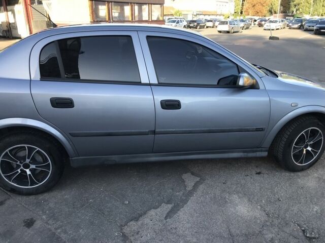 Серый Опель Астра, объемом двигателя 1.4 л и пробегом 254 тыс. км за 3500 $, фото 5 на Automoto.ua